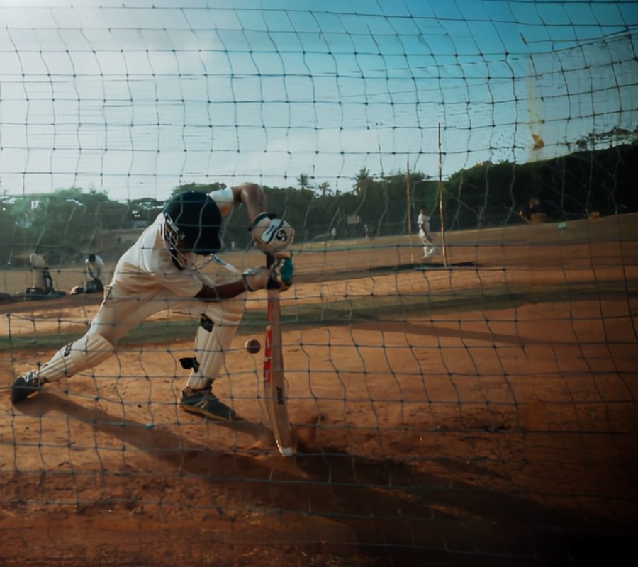 picture of a boy playing cricket